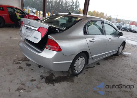 2009 Honda Civic Hybrid from USA, damaged, VIN JHMFA36289S011250